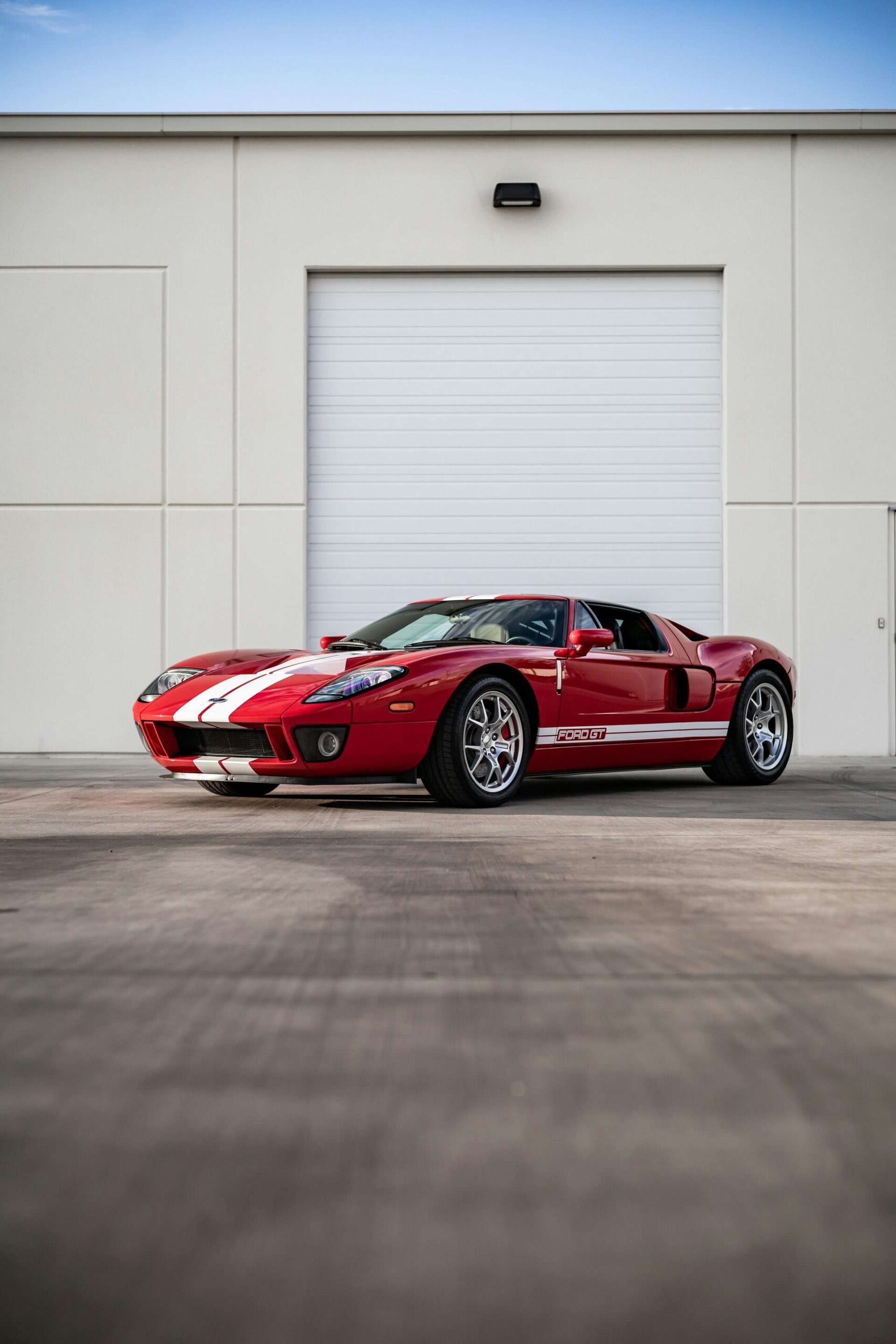 Side view of a Ford GT highlighting its aggressive stance and aerodynamics.