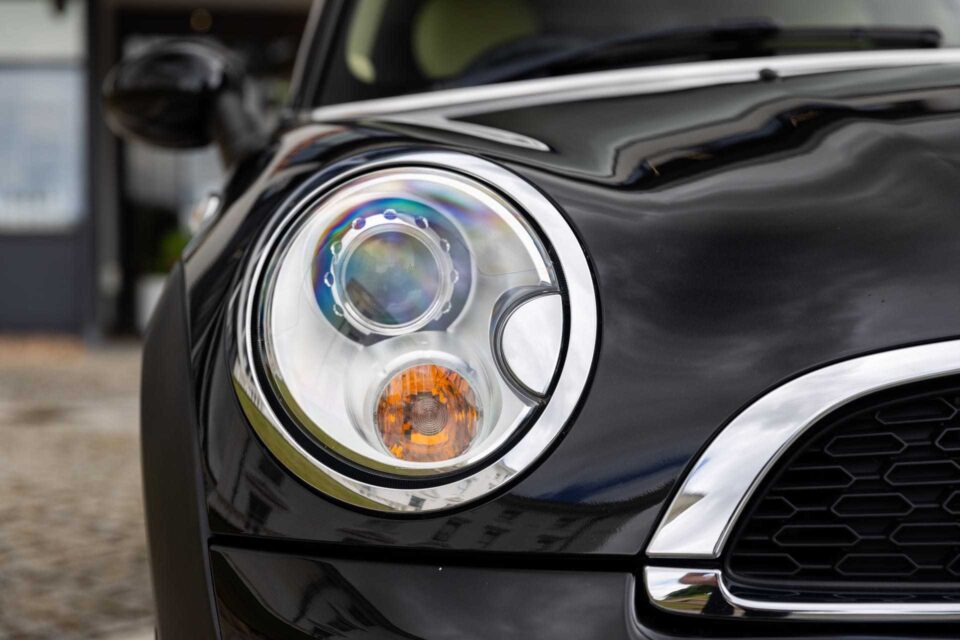 Close up of a 2013 mini cooper s goodwood edition headlight.