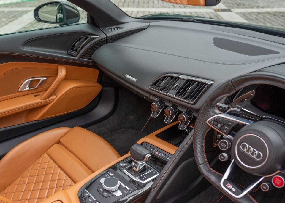 Interior view showcasing the handcrafted leather seats and premium dashboard.